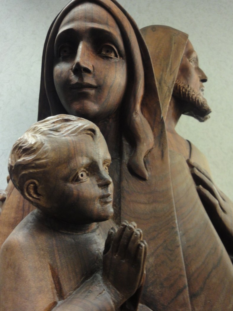 holy family in wood